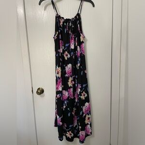 Black with Floral print sleeveless summer dress size large made of polyester.